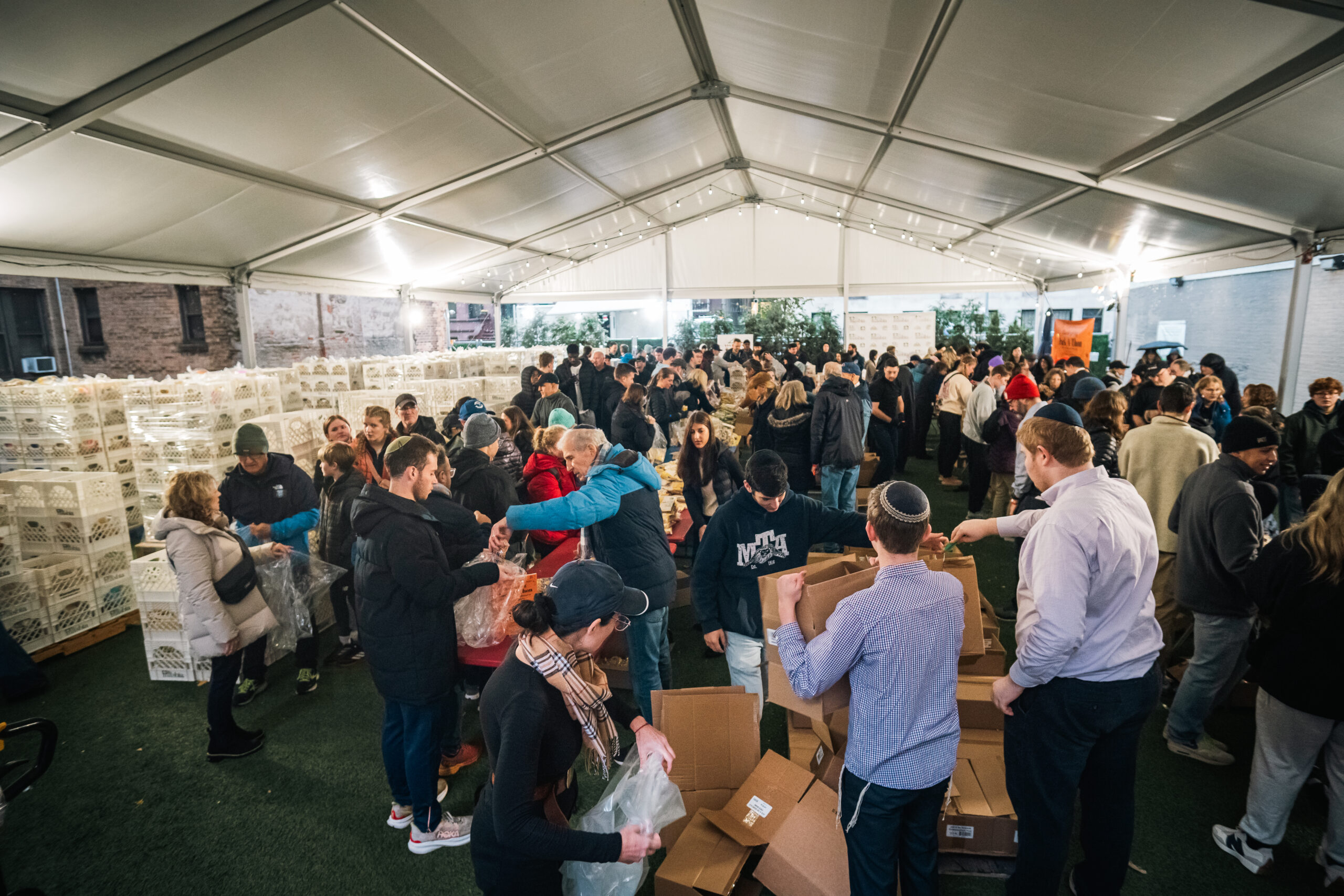 Lisa Rozner of CBS Reporting on the Thanksgiving Hunger Alleviation Pack-A-Thon at Shearith Israel for Masbia